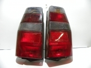 COPPIA FANALI FIAT DUNA SW - FIORINO II SERIE POSTERIROE COLORE FUME COMPLETI